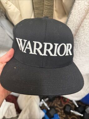 The Classic Black Hat with White 'WARRIOR' Embroidery